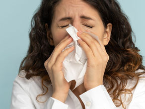 Sick Leave. Auckland, Wellington, Christchurch. Woman blowing nose.