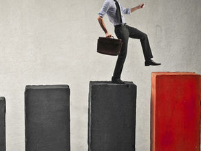 Fair and Reasonable Process. Auckland, Wellington, Christchurch. A man in a suit stepping up stairs.