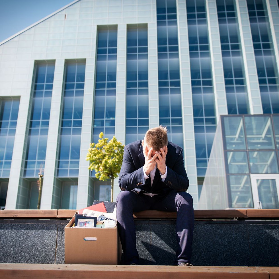 90 day trial. Auckland, Welllington, Christchurch. Man outside building with head in hands.  
