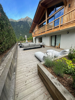 Outdoor terrace with mountain views.