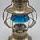 Thumbnail: M.M. Buck Co. White brass conductor with wheel cut blue over clear globe 