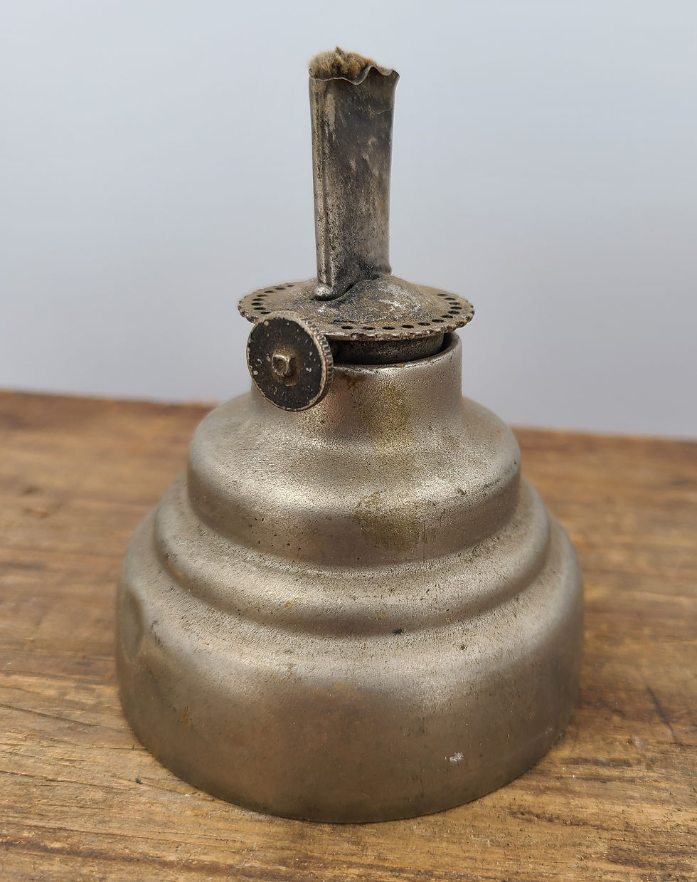 Thumbnail: The Neverout safety lamp fount made by Rose Mfg.