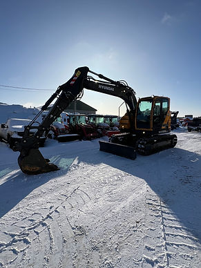 logo Nordmax avec équipements lourds en filigrane