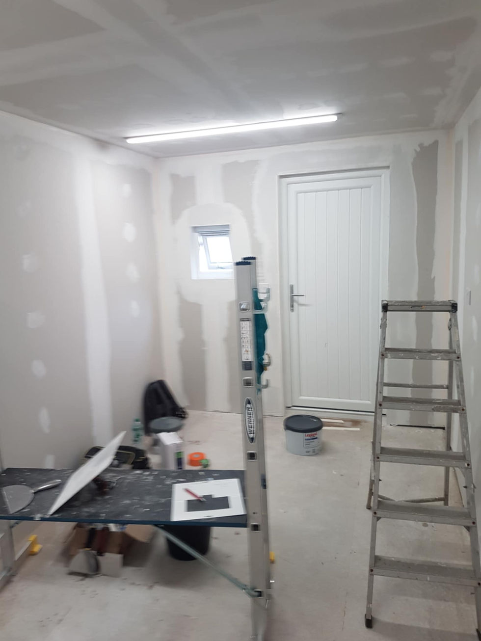 Plastering work in progress, hallway, tools