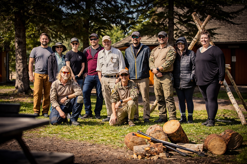Outdoor adventure group in a campsite.png