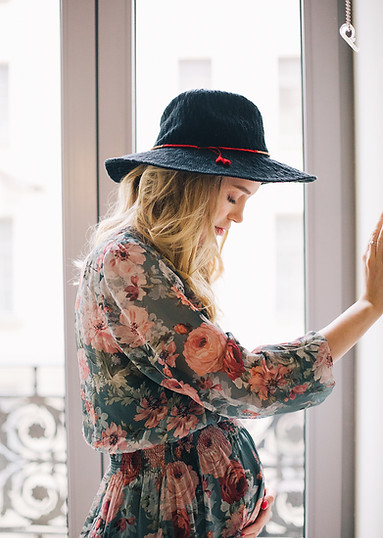 pregnant-woman-in-floral-long-sleeved-dr