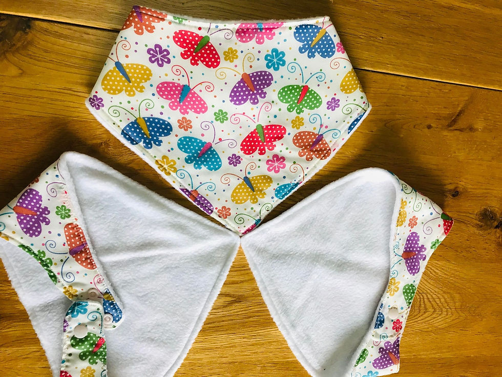 Thumbnail: Cream with multicoloured butterfly. Dignity bib. Dribble bib. Bandana Style