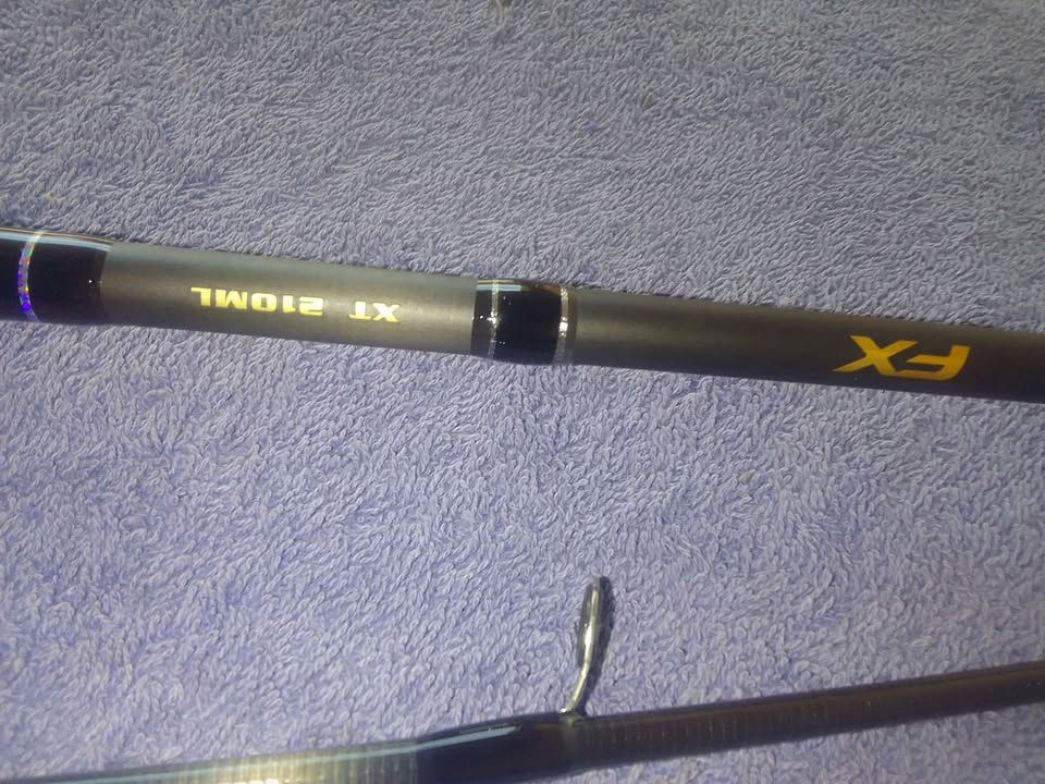Thumbnail: New Shimano FX XT 2pce 7ft Graphite fishing Rods.