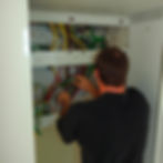 Electrician installing electrical wiring in Orlando, Florida 32819.