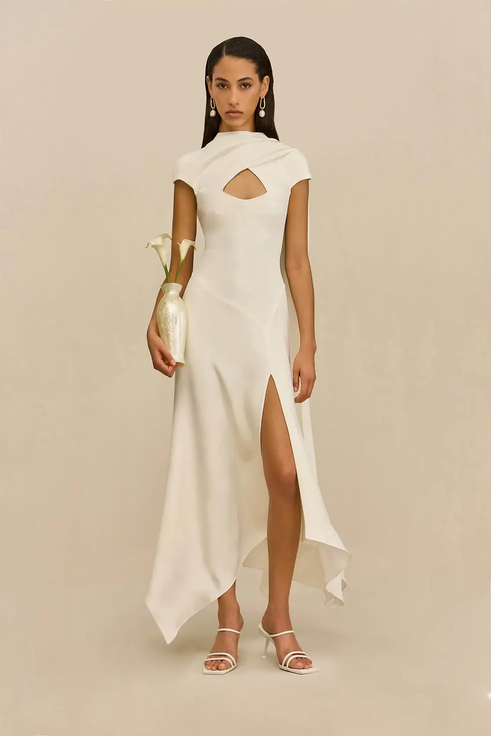 white bridal dress with cutouts