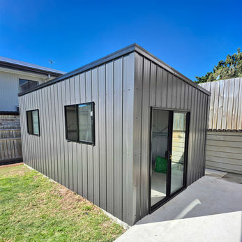 Skillion or Monoplain Shed at Stretton Brisbane. Colorbond Monument with Metroclad wall cladding
