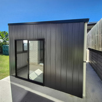 Skillion or Monoplain Shed at Stretton Brisbane. Colorbond Monument with Metroclad wall cladding