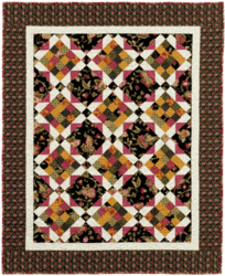 French Garden Quilt pattern by Swirly Girls Design in browns, yellows, pinks, and blacks
