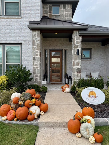 Elegant pumpkin porch display for a family home in Plano, TX.