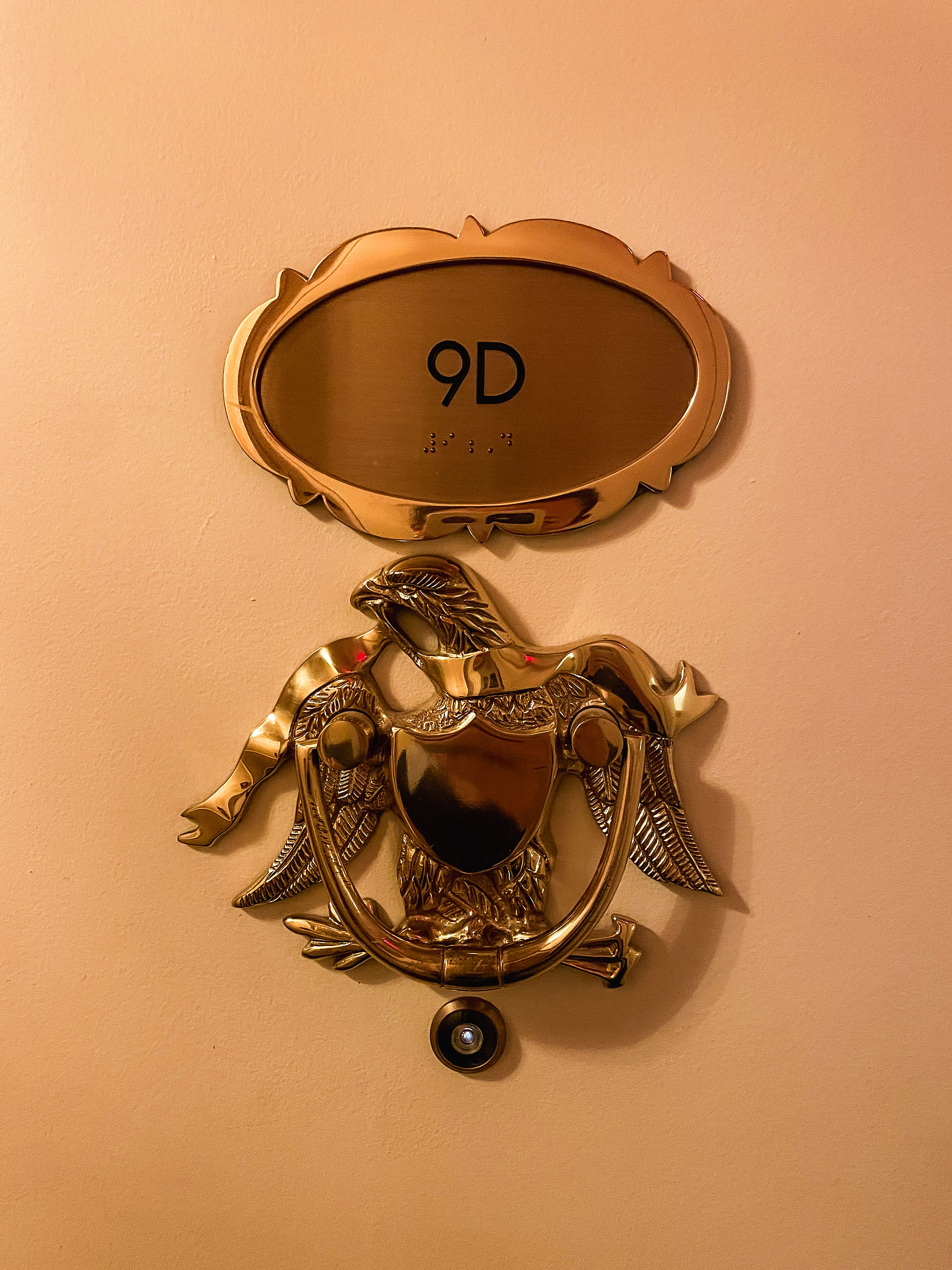 Vintage door knocker outside of a one bedroom suite at The Kimberly Hotel in NYC