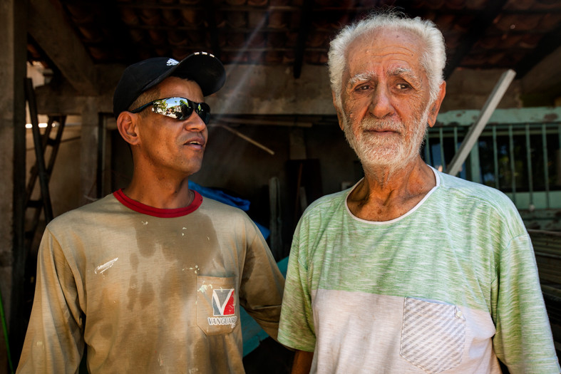 Nilson (Left) speaks with his boss, an immigrant to Brazil from Lebanon. Many immigrants ventured to Brazils interier during the gold rush to escape political distress.