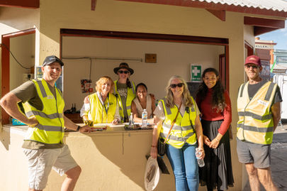 Volunteer crew at Kiosk at Golden Horseshoes Festival