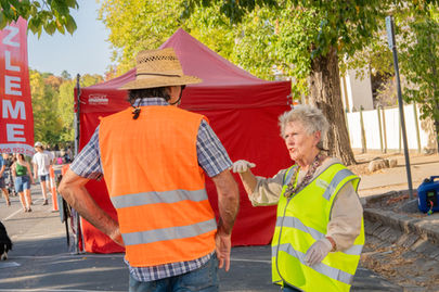 Volunteers chatting at Golden Horseshoes Festival