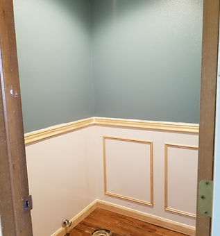 Bathroom redo. wainscoting, new sink, toilet, and paint