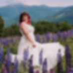 Bride dancing in a field of flowers