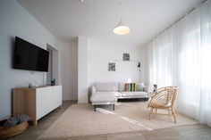 tv, sofa and the living room in light colors