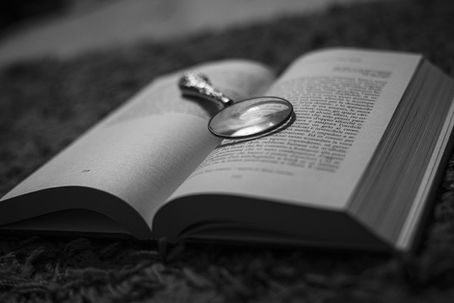 Magnifying glass investigation document