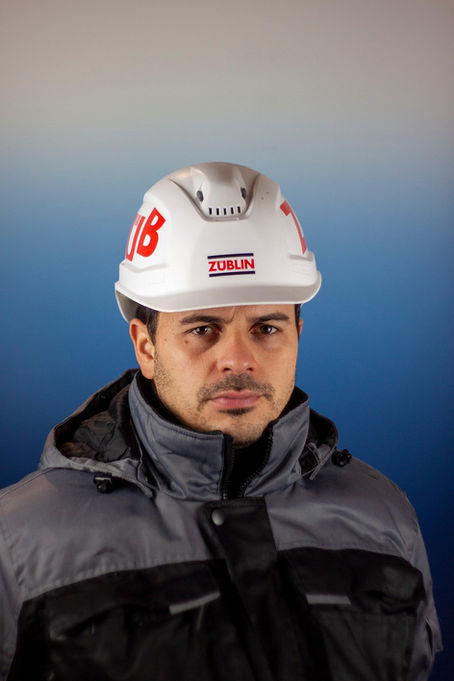 Construction worker with helmet portrait
