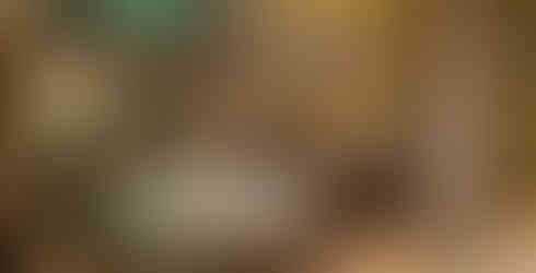 Luxury Travertine Mediterranean Master Bathroom Remodel with ground built-in jacuzzi tub, wall candle niches