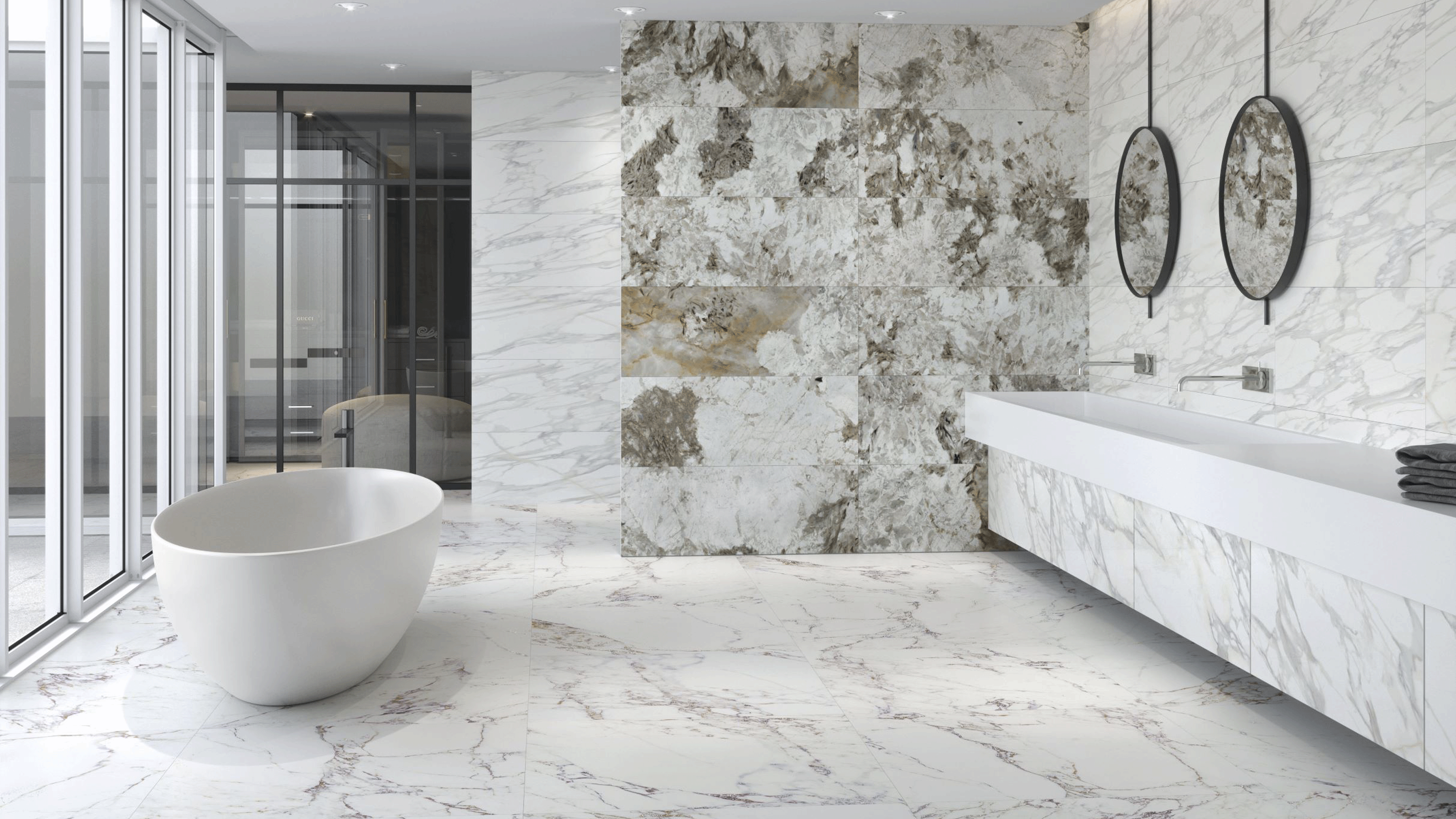 Luxury Condo White Breccia and Calacatta Marble Stone Cladding Bathroom with standing tub and thick white countertop floating vanity.