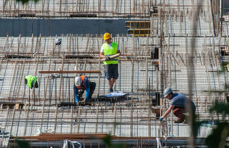 Construction site workers housebuilding