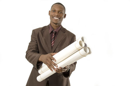 Architect reviewing construction plans