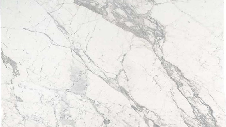 Luxury Calacatta Marble Stone used in Commercial and Residential Floor Slab Tiling, Wall Cladding, Furniture, Cabinetry, Decor, Accent Walls, Table Top, Couch, Chair, Window Sill, Frames, Moldings, Doors, Vanity, Console, Staircase, Stair Steps, Insets, Bed Frames and Deck Applications.