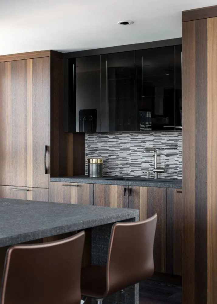 Luxury Residential Kitchen Remodeling Project in Miami, Florida using Wall Dark Tinted Doors Cabinetry.