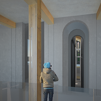 a man standing looking through the interior hallway of the building circulation space, a curved top space