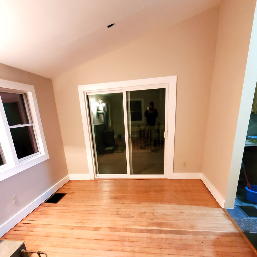 New patio door that exits to the new rear deck.