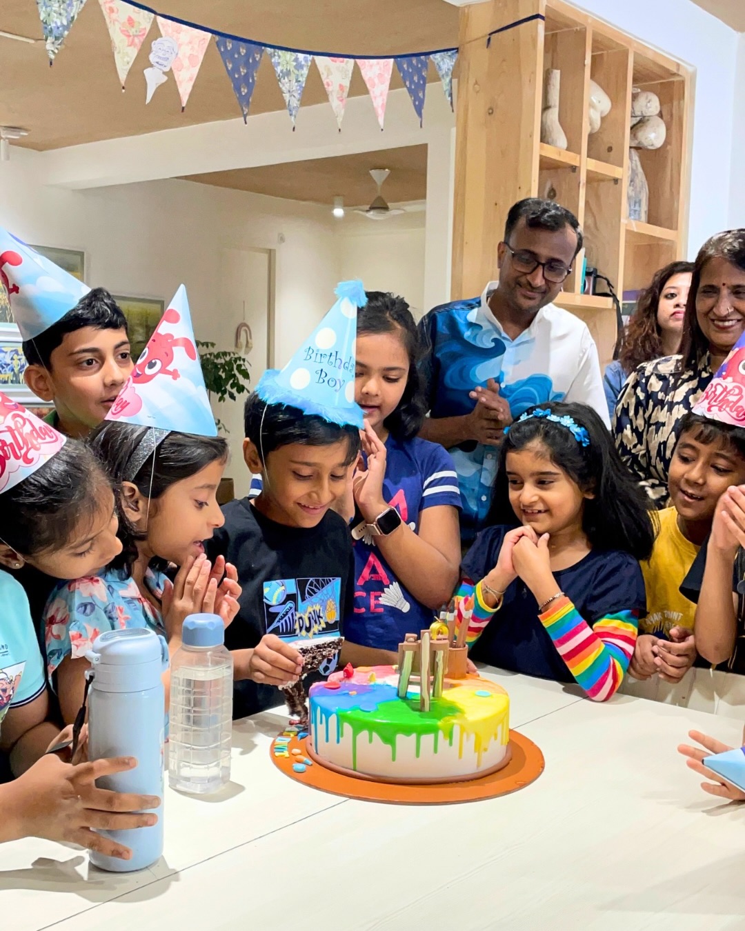 Birthday cake moment at an Alive Studio celebration