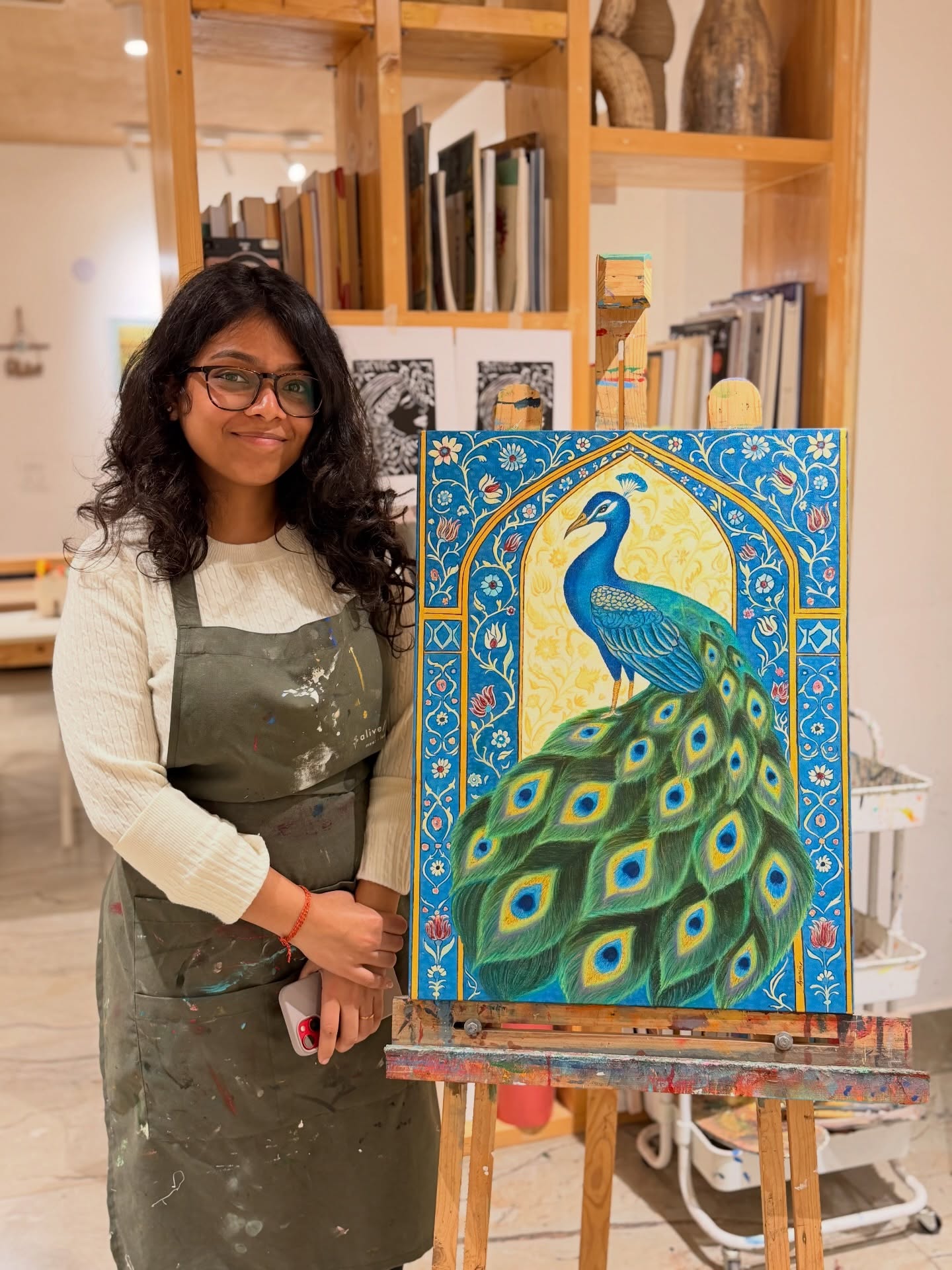 A detailed peacock canvas painting at Alive Studio Gurgaon