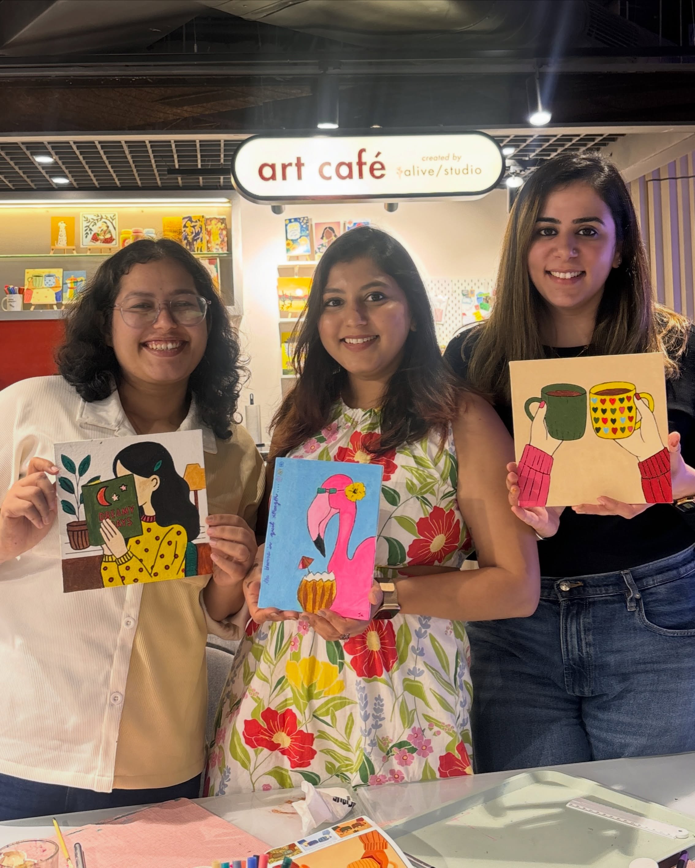 Kids making art at the Delhi art cafe