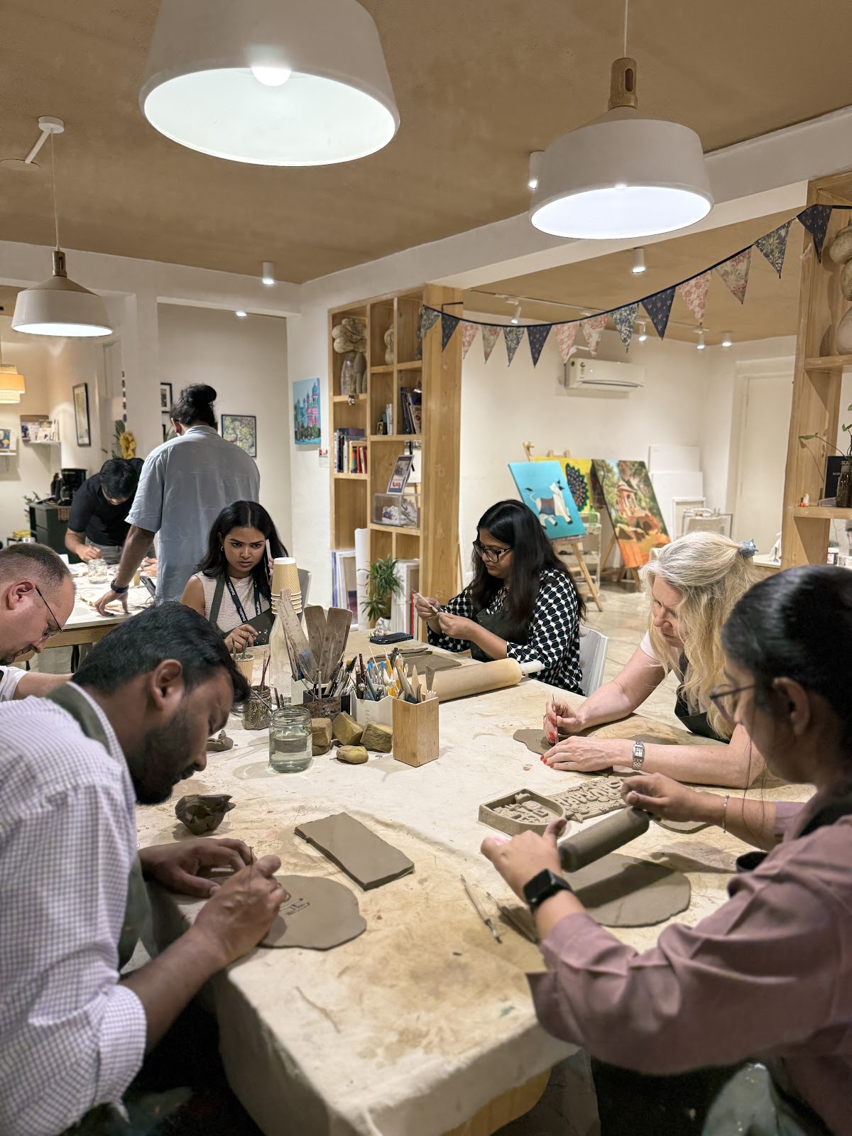 A team painting together at the Gurgaon studio