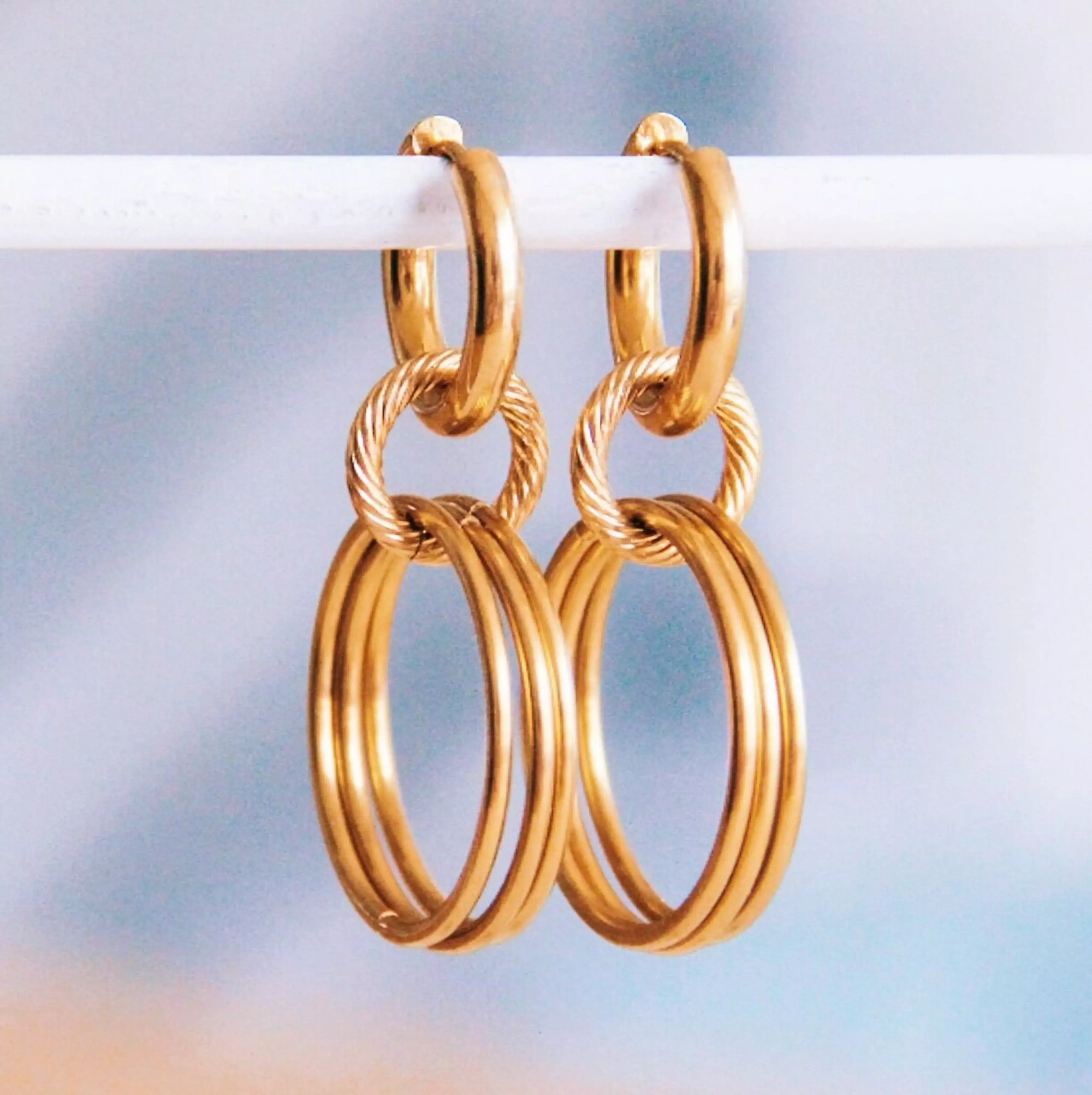 Boucles d'oreilles anneaux torsadés - or