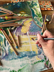 drawing with pensils and hand, showing the creation process