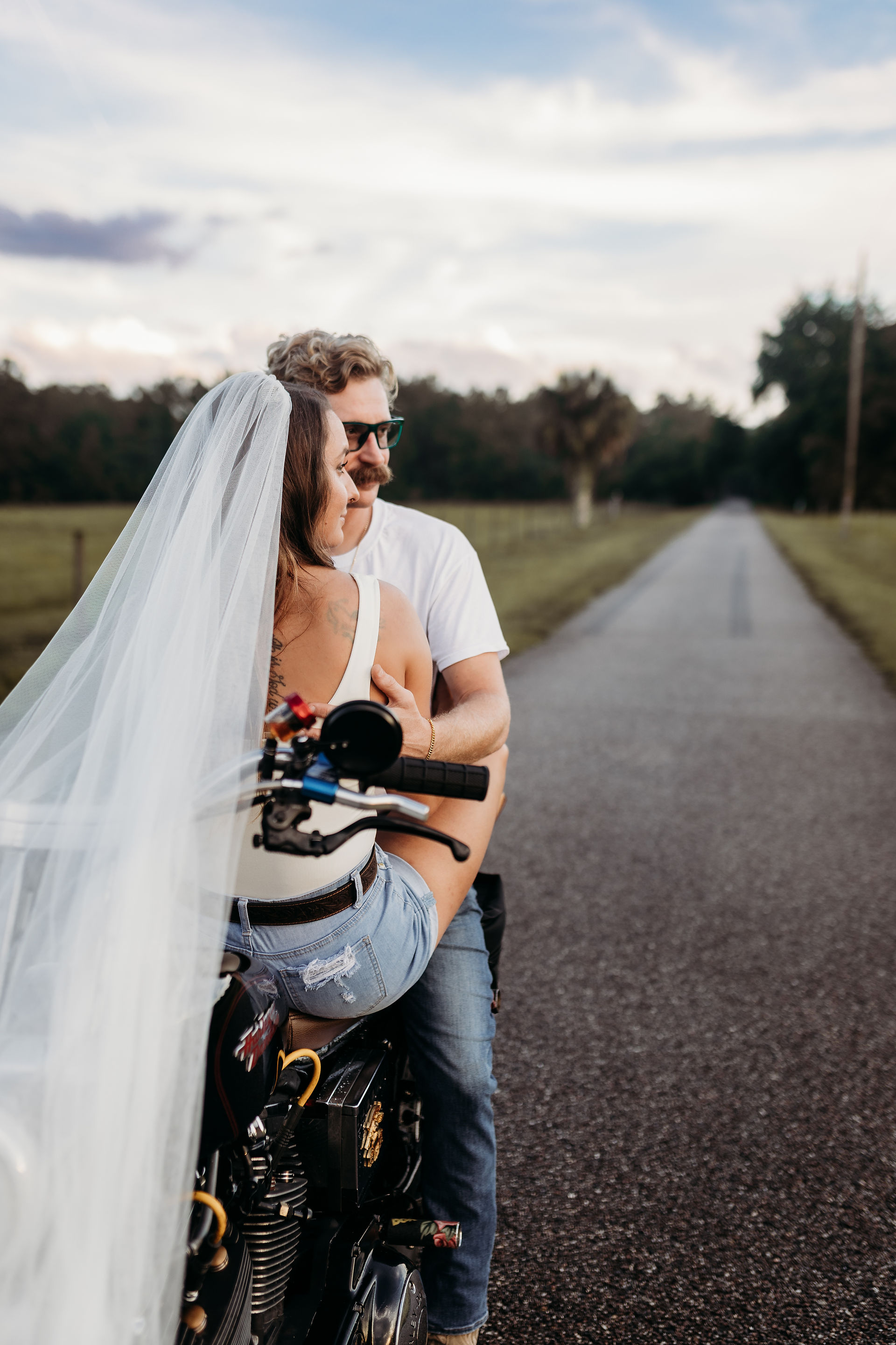 Motorcycle couple photoshoot sunset