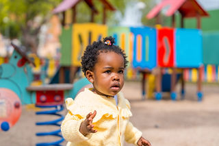 a-little-african-girl-playing-on-playground-2024-04-24-12-06-20-utc.jpg