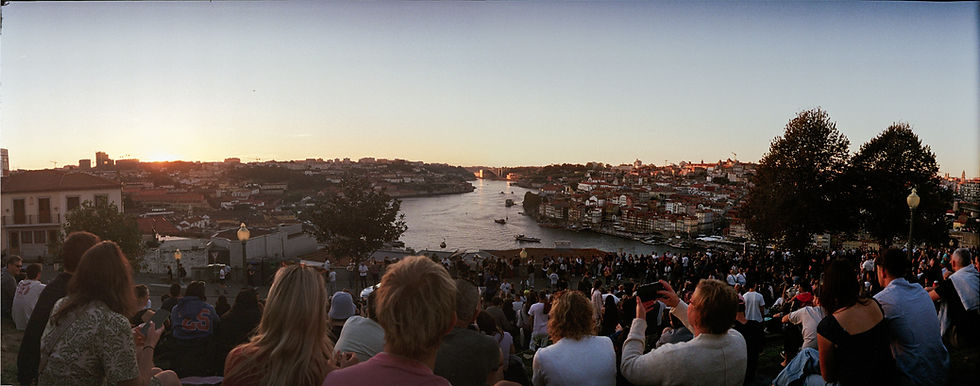 sunset in portugal with crowd watching taken on widelux f6