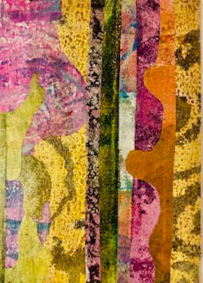A vibrant abstract painting dominated by rich yellows, oranges, and pinks, with vertical textural stripes.