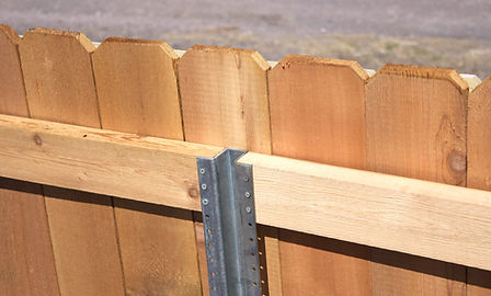 Steel Post on cedar Fence