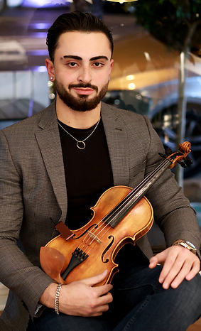 Violinist Nima at a private event in Melbourne CBD