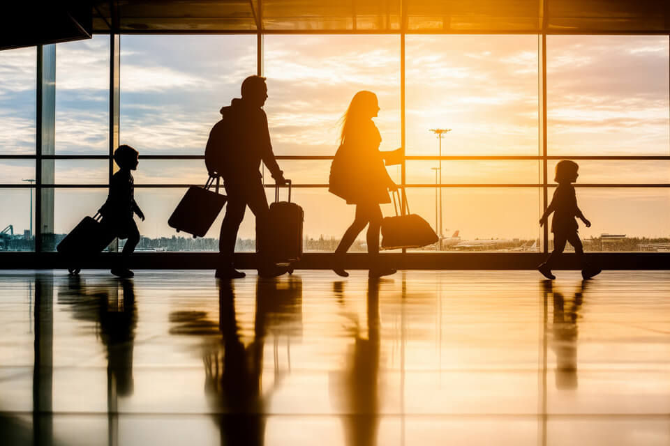 Family running in airport
