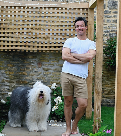 Saulo Ouverney and Sheepdog Skye together in the garden