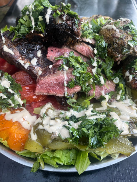 prime fillet mingione cooked to perfection on open fire grill